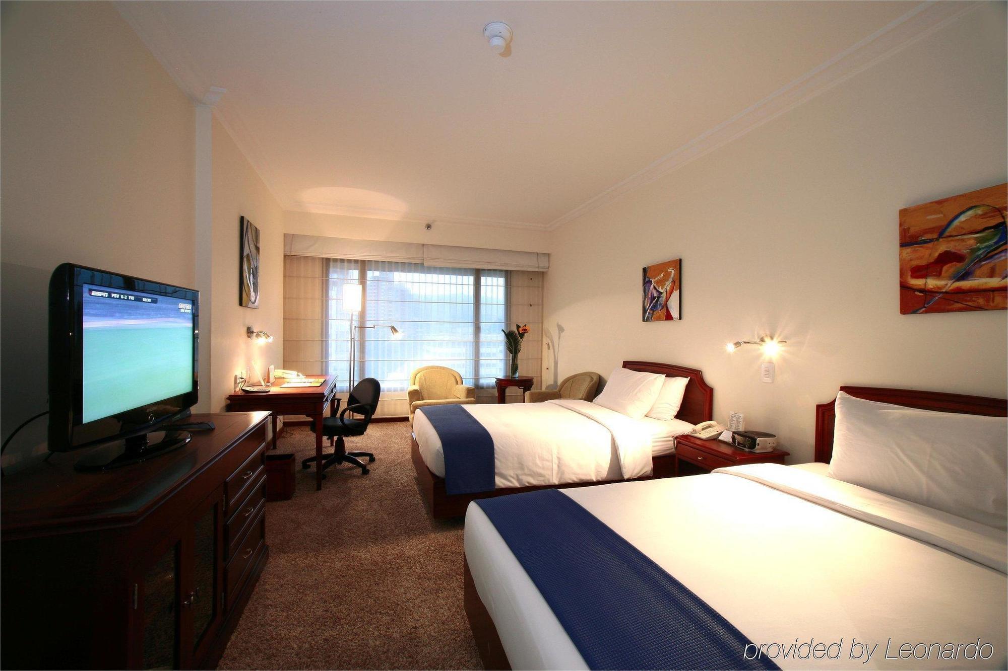 Nh Cali Royal Hotel Quarto foto